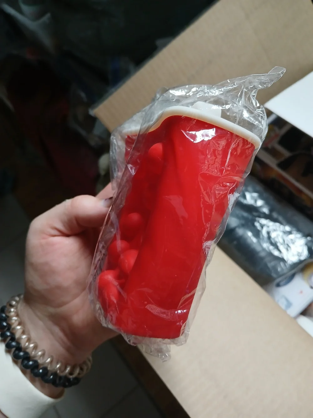 a Soda Clicker fidget toy or a similar 3D-printed accessory.